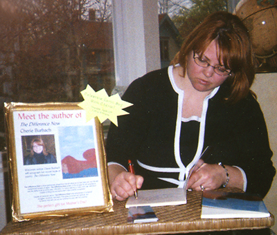 the author signs